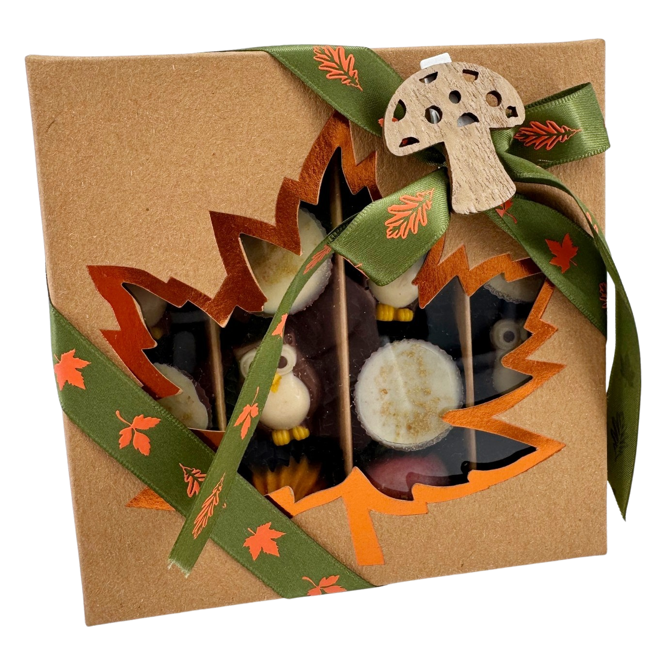 Mix van herfstpralines in een bruine geschenkdoos